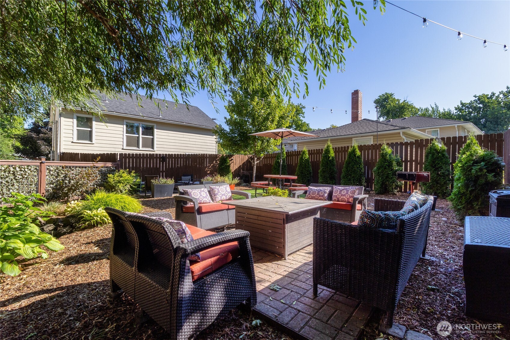 15 Eagan Street Walla Walla, WA 99362 - Photo 13 of 20 a view of patio with table and chairs potted plants and large tree