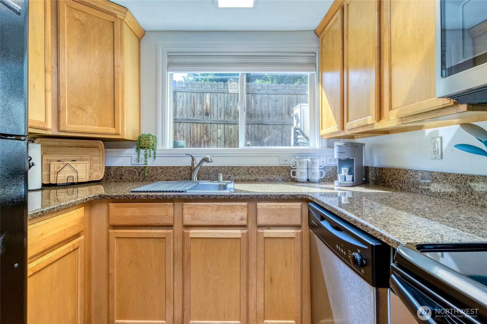 15 Eagan Street Walla Walla, WA 99362 - Photo 17 of 20 a kitchen with stainless steel appliances granite countertop a sink and a window