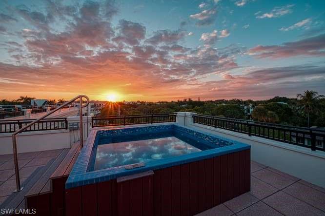 490 5th Street South, Unit 101 Naples, FL 34102 - Photo 30 of 34 a view of a terrace with skyline