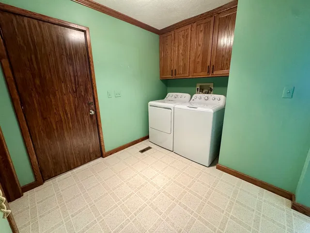 a room with a sink and a window