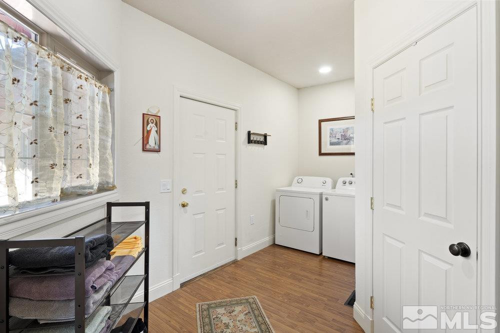 21860 Bowie Road Reno, NV 89521 - Photo 18 of 24 a view of a storage & utility room with a window