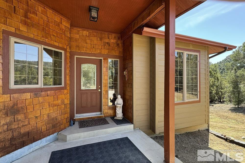 21860 Bowie Road Reno, NV 89521 - Photo 3 of 24 a view of front door of the house