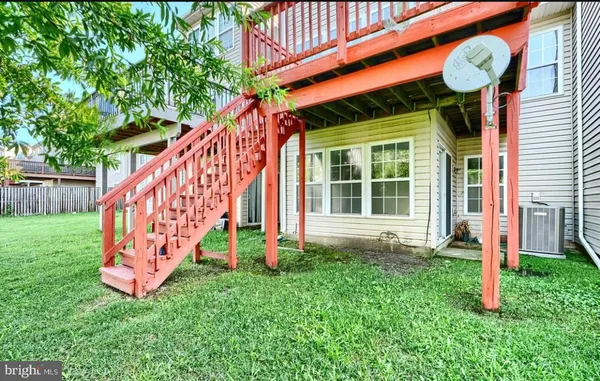 a view of balcony with wooden floor