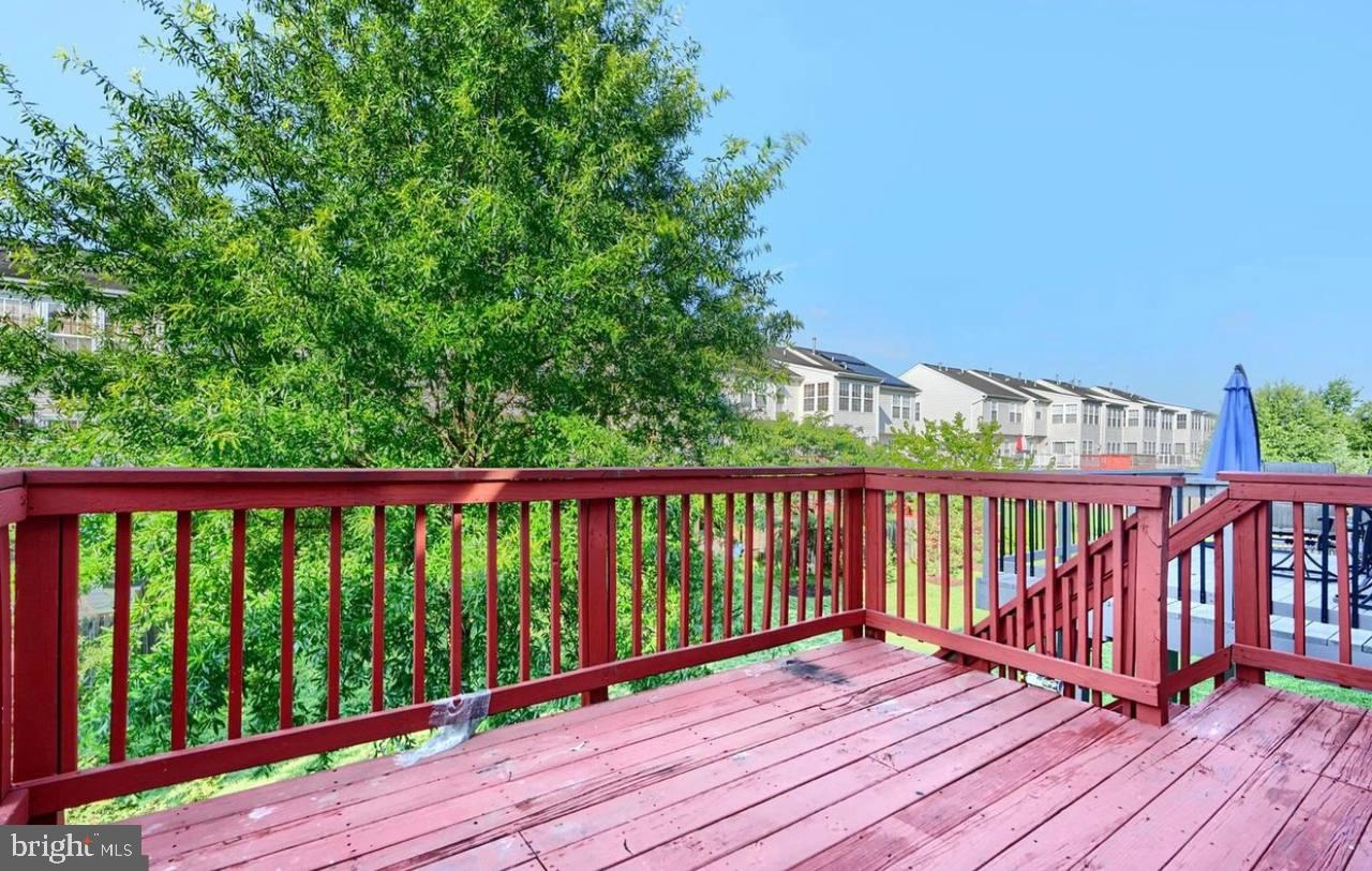9863 Decatur Road Middle River, MD 21220 - Photo 32 of 33 a view of balcony with wooden floor