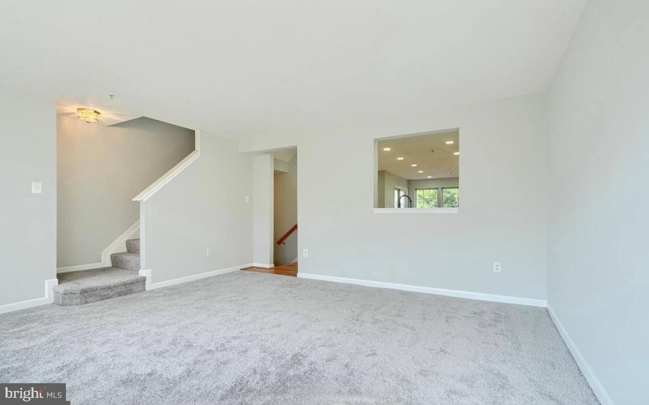 9863 Decatur Road Middle River, MD 21220 - Photo 9 of 33 a view of an empty room with a window