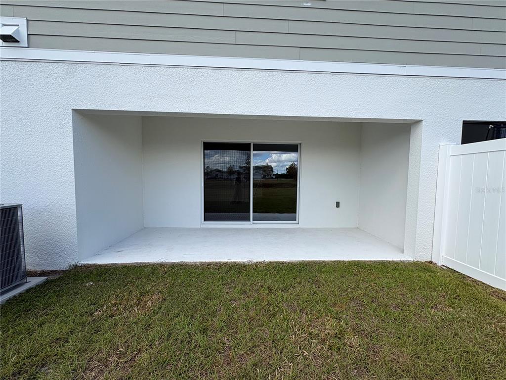 2529 Starry Point St. Cloud, FL 34769 - Photo 20 of 21 a view of an empty room with a window