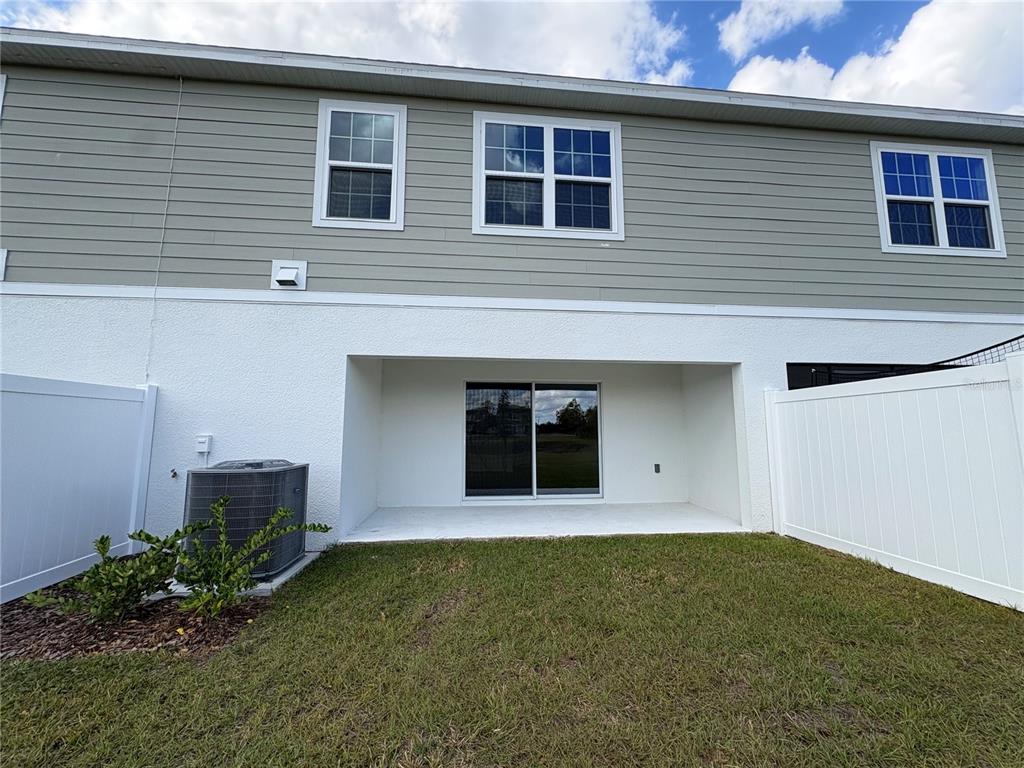 2529 Starry Point St. Cloud, FL 34769 - Photo 21 of 21 a front view of a house with an outdoor space