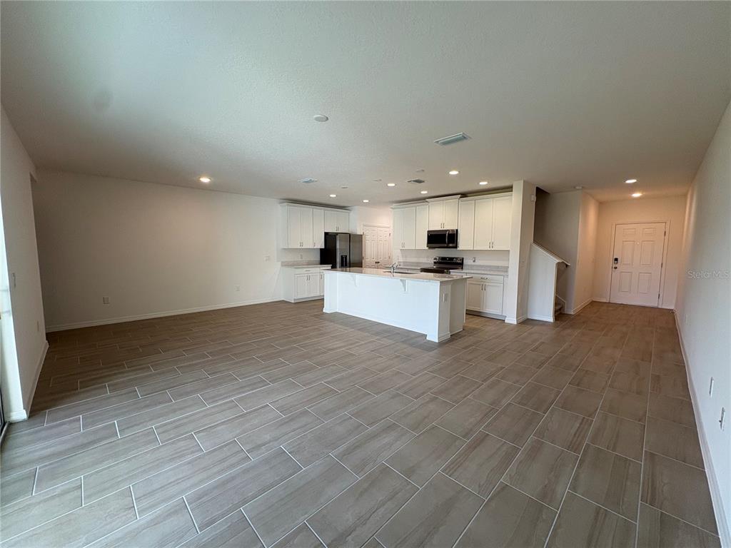 2529 Starry Point St. Cloud, FL 34769 - Photo 7 of 21 a view of a kitchen with a sink