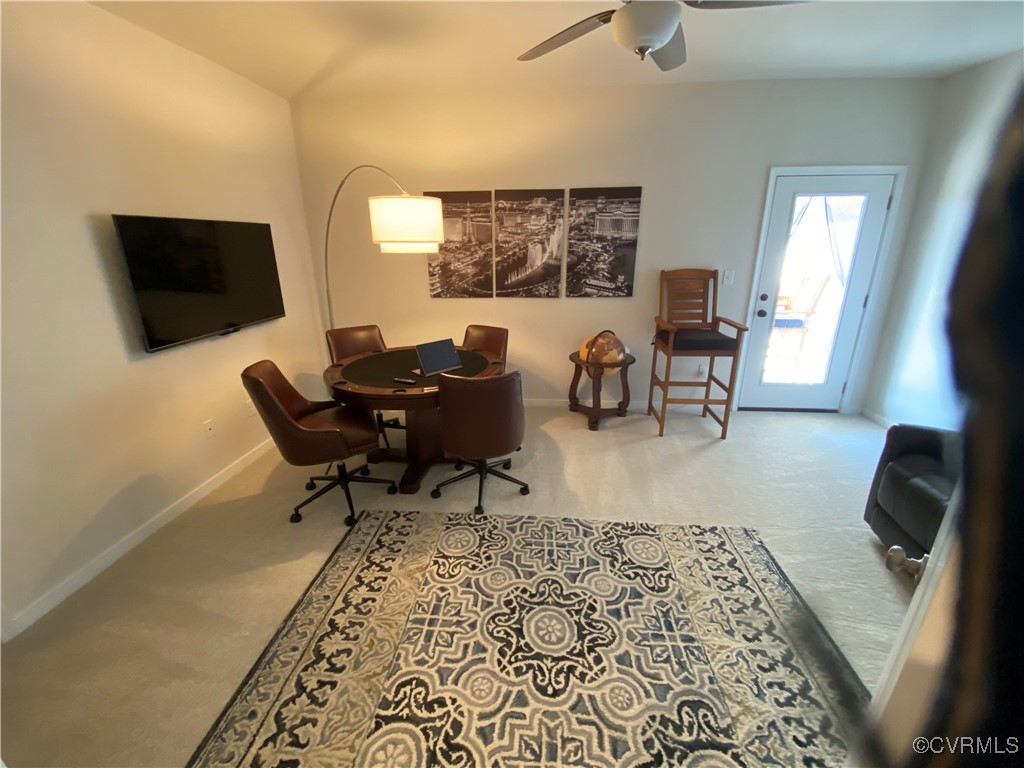 1900 Roseneath Road, Unit 4B Richmond, VA 23230 - Photo 3 of 10 a living room with furniture and a flat screen tv