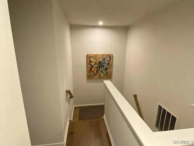 a bathroom with a sink a mirror and a shower