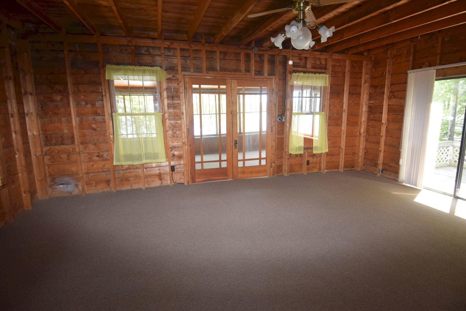 11-12 Rocky Point Road Embden, ME 04958 - Photo 35 of 75 camp 2 - living and dining room b