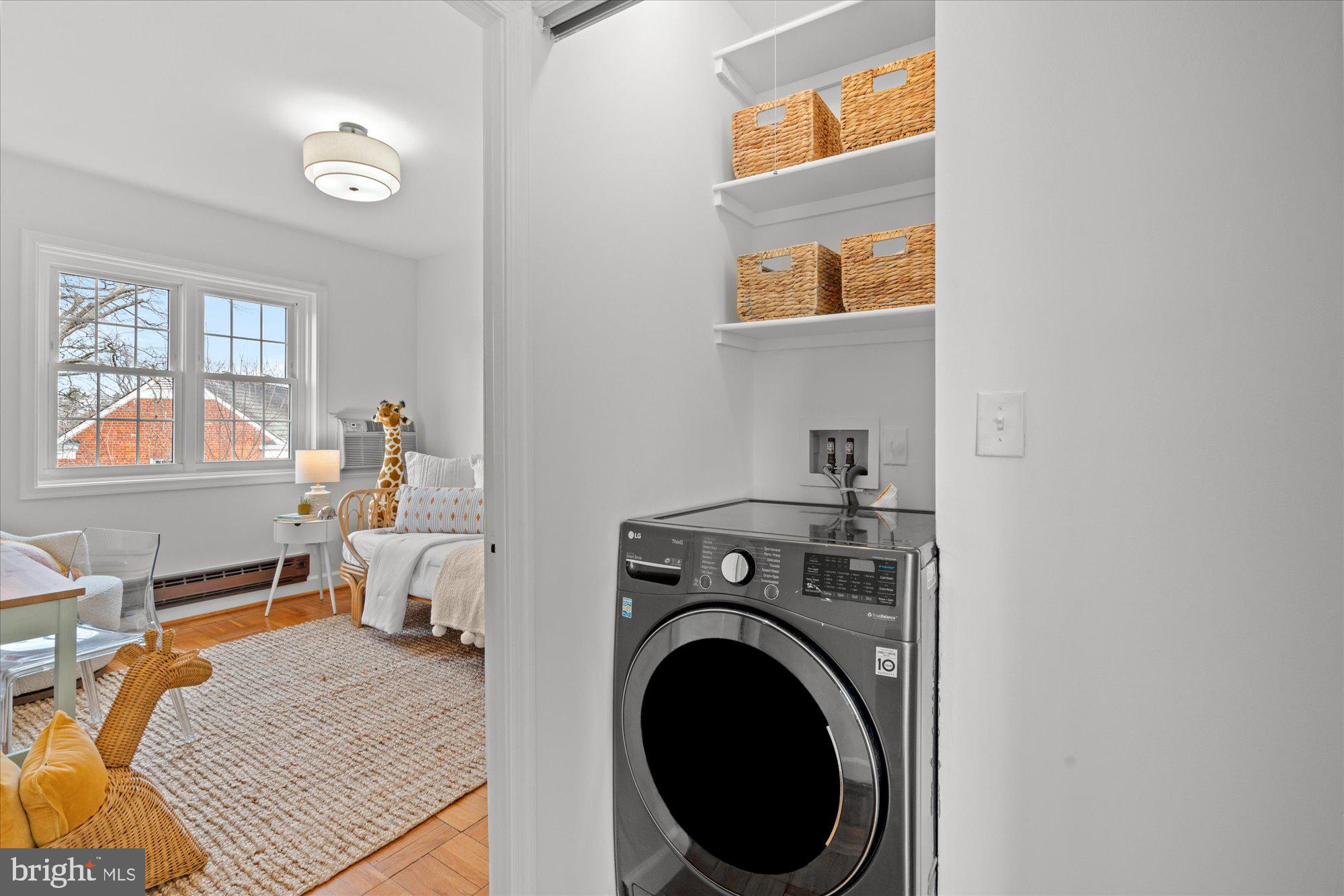 3206 Gunston Road Alexandria, VA 22302 - Photo 20 of 25 a view of a workspace with furniture and a window