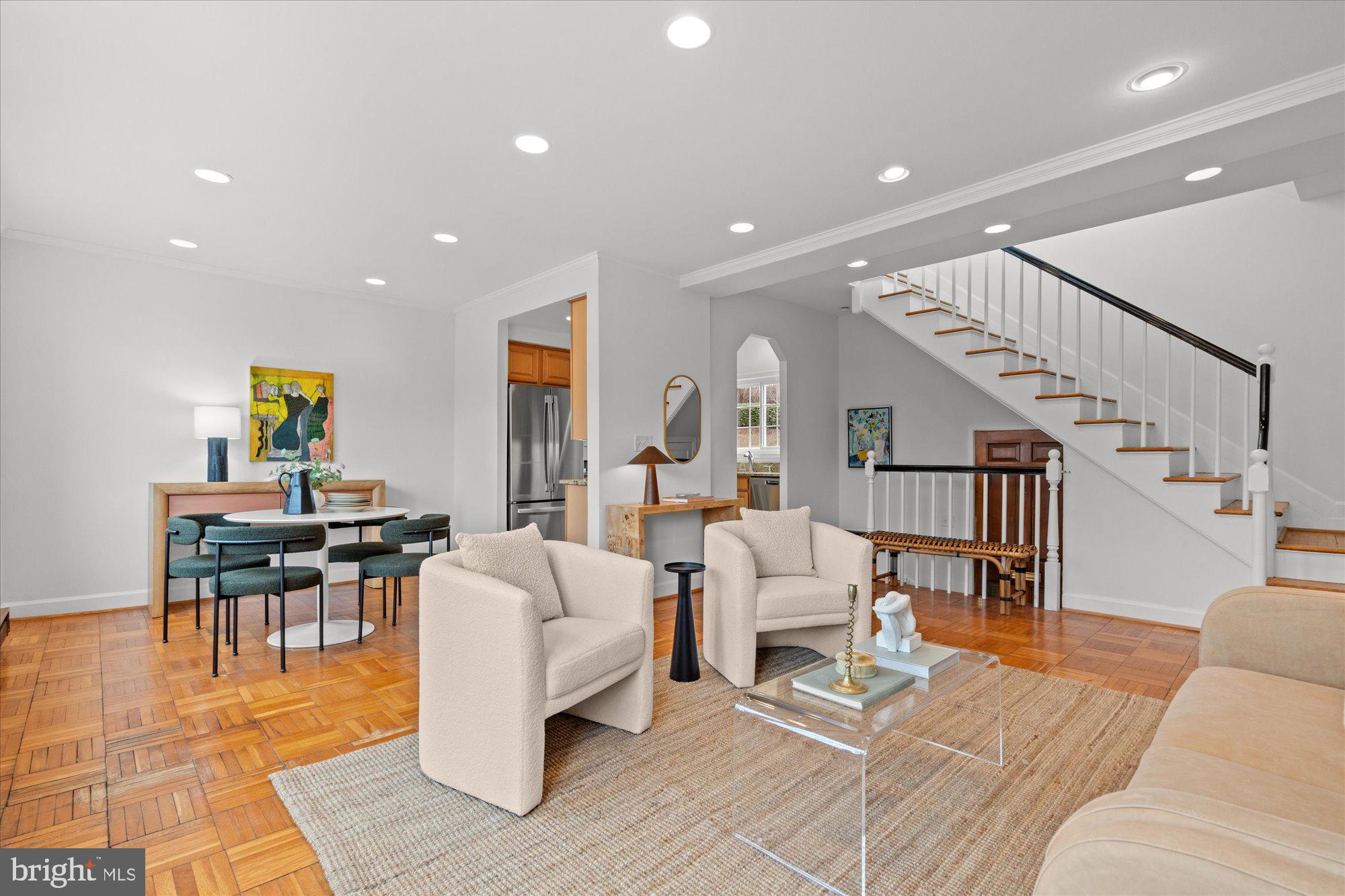 3206 Gunston Road Alexandria, VA 22302 - Photo 5 of 25 a living room with furniture a rug and a table