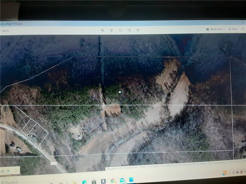 0 Mountain View Road Germanton, NC 27019 - Photo 1 of 10 Field across creek is part of the land
