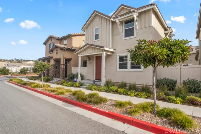 a front view of a building with sign board