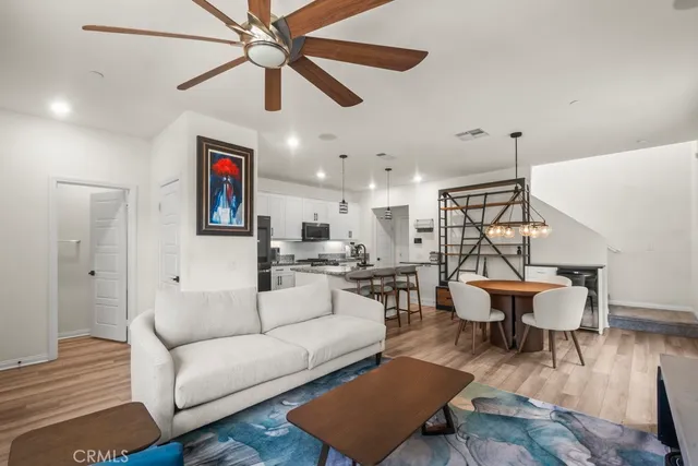a living room with furniture and a rug