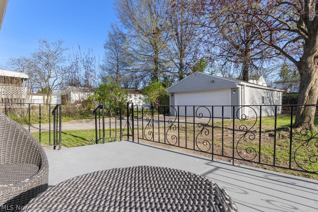 9620 David Road Garfield Heights, OH 44125 - Photo 35 of 36 Deck featuring a garage and an outdoor structure