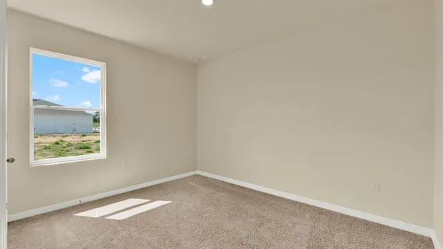 an empty room with a window