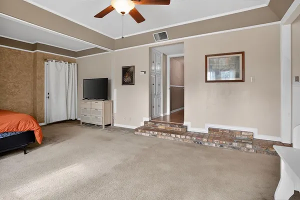 a view of a livingroom with a flat screen tv