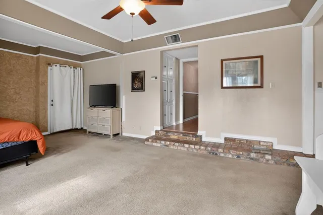 a view of a livingroom with a flat screen tv