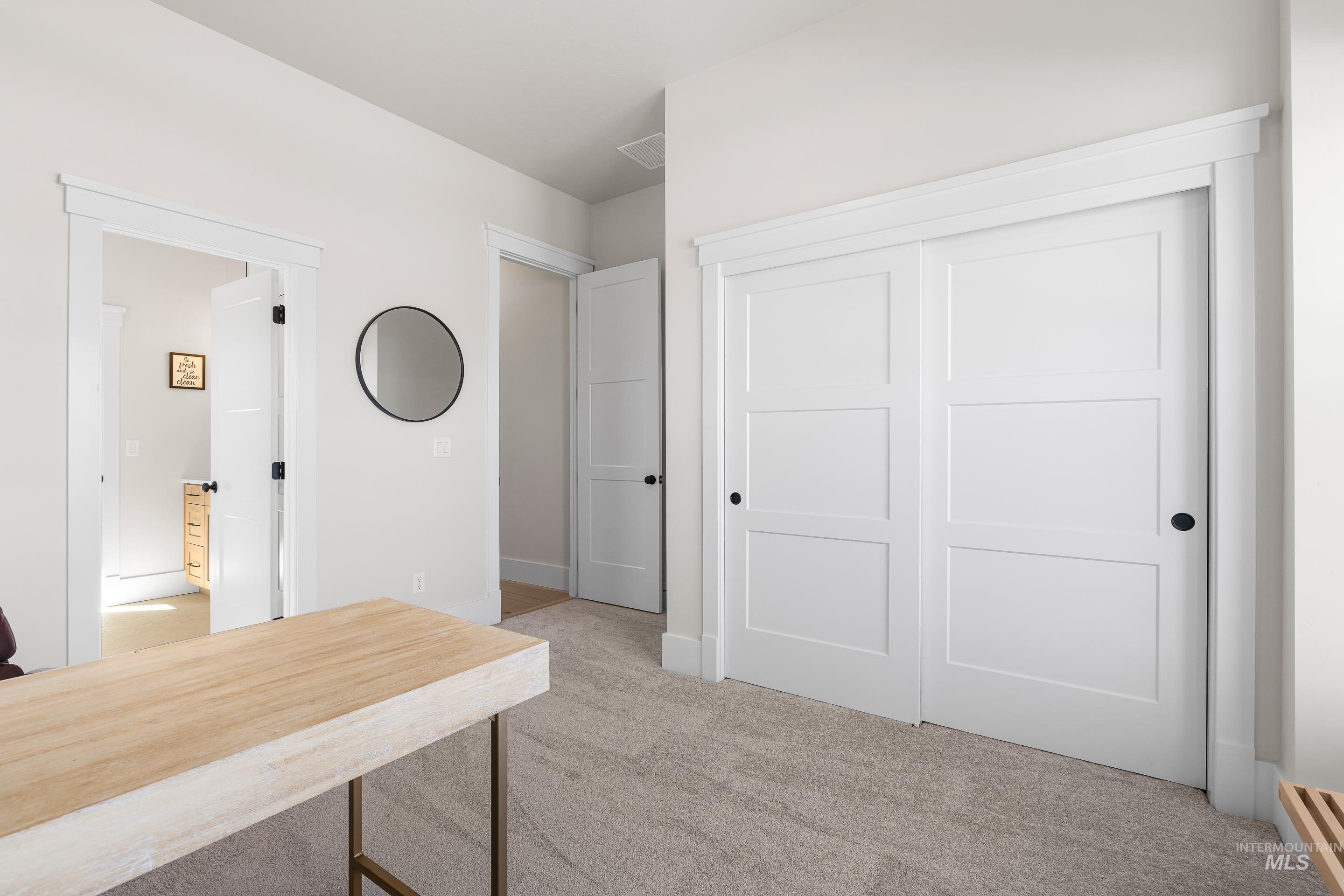 4217 North Bryant Way Meridian, ID 83646 - Photo 20 of 46 Unfurnished office with light carpet and baseboards