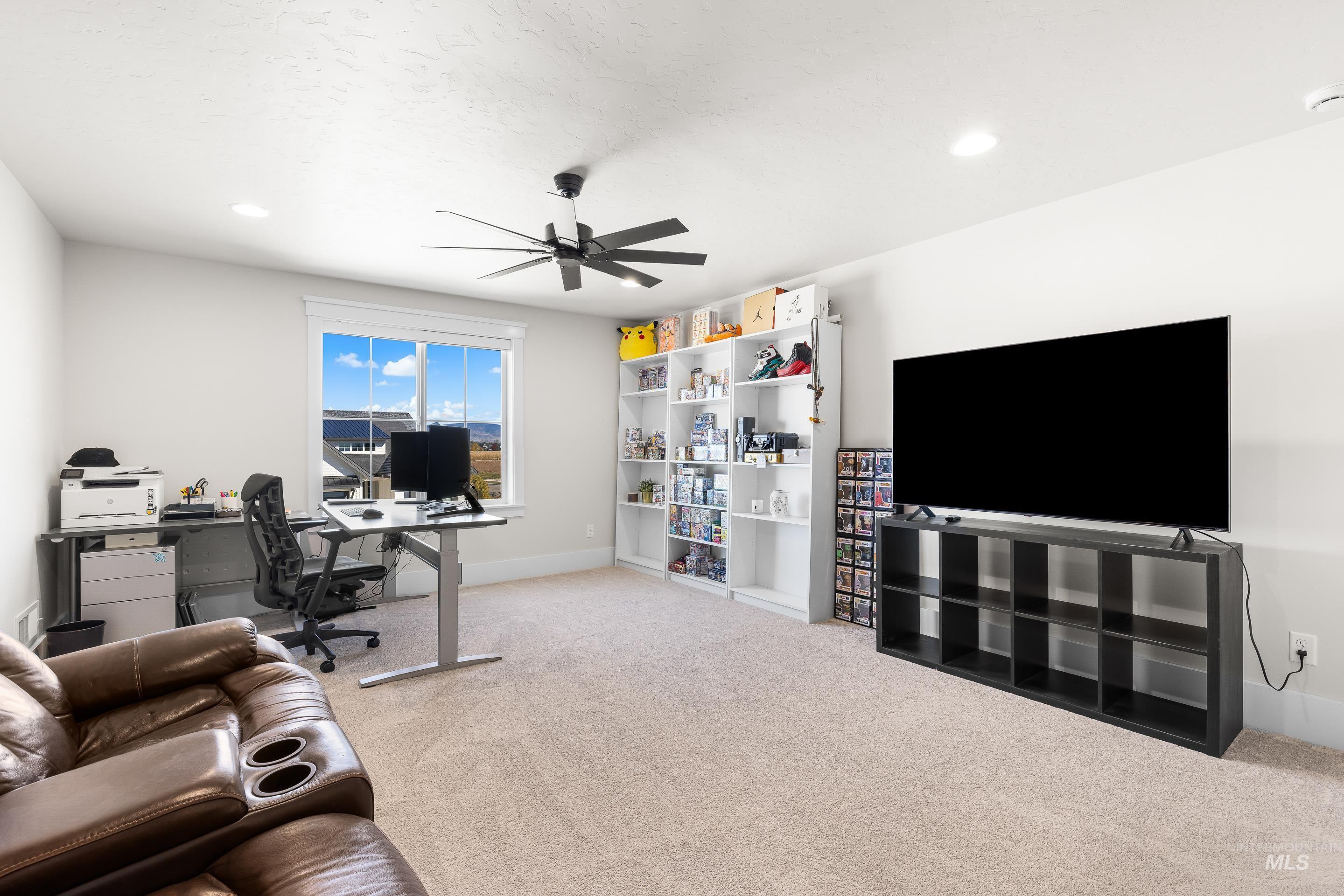 4217 North Bryant Way Meridian, ID 83646 - Photo 32 of 46 Office space featuring light colored carpet, a ceiling fan, and recessed lighting