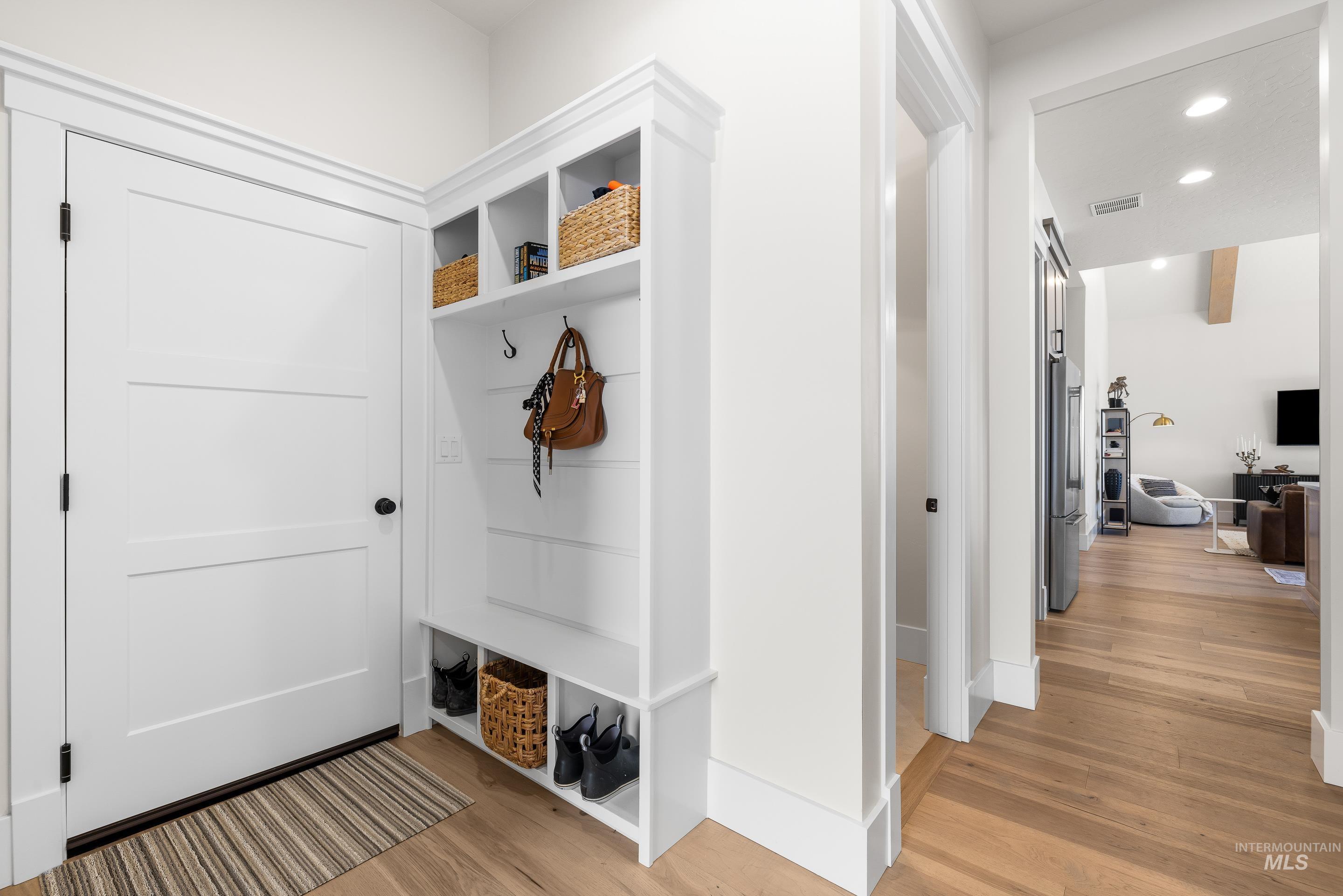 4217 North Bryant Way Meridian, ID 83646 - Photo 36 of 46 Mudroom featuring light wood-type flooring and recessed lighting