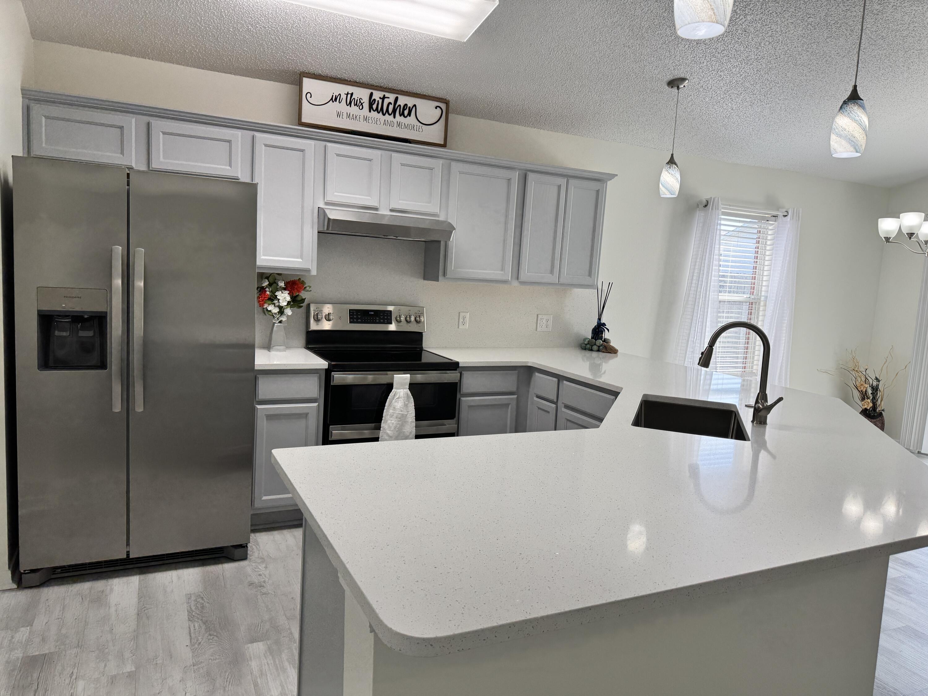 296 Limestone Circle Crestview, FL 32539 - Photo 1 of 29 Open Living/Kitchen/Dining Area