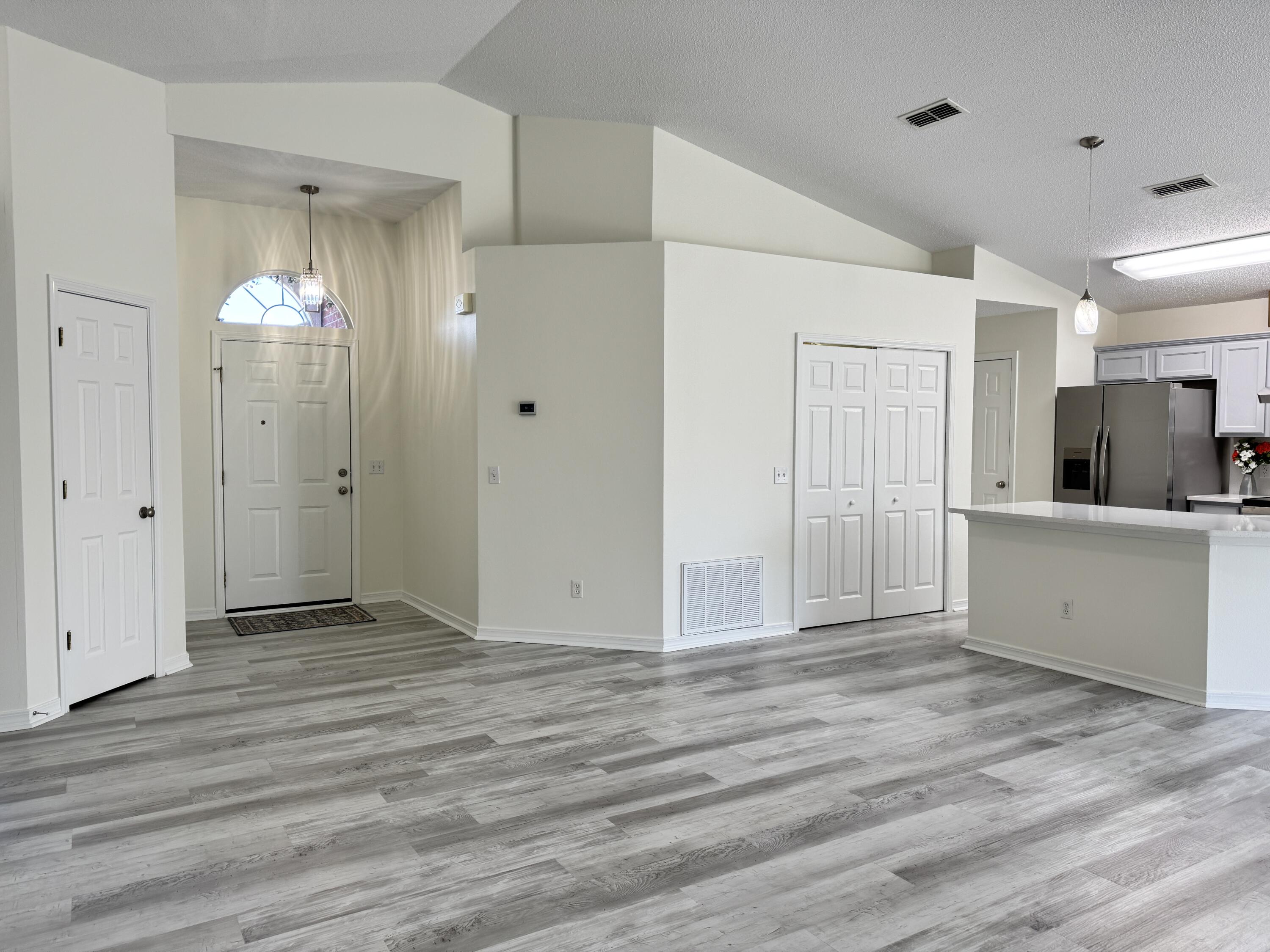 296 Limestone Circle Crestview, FL 32539 - Photo 17 of 29 Open Living/Kitchen/Dining Area