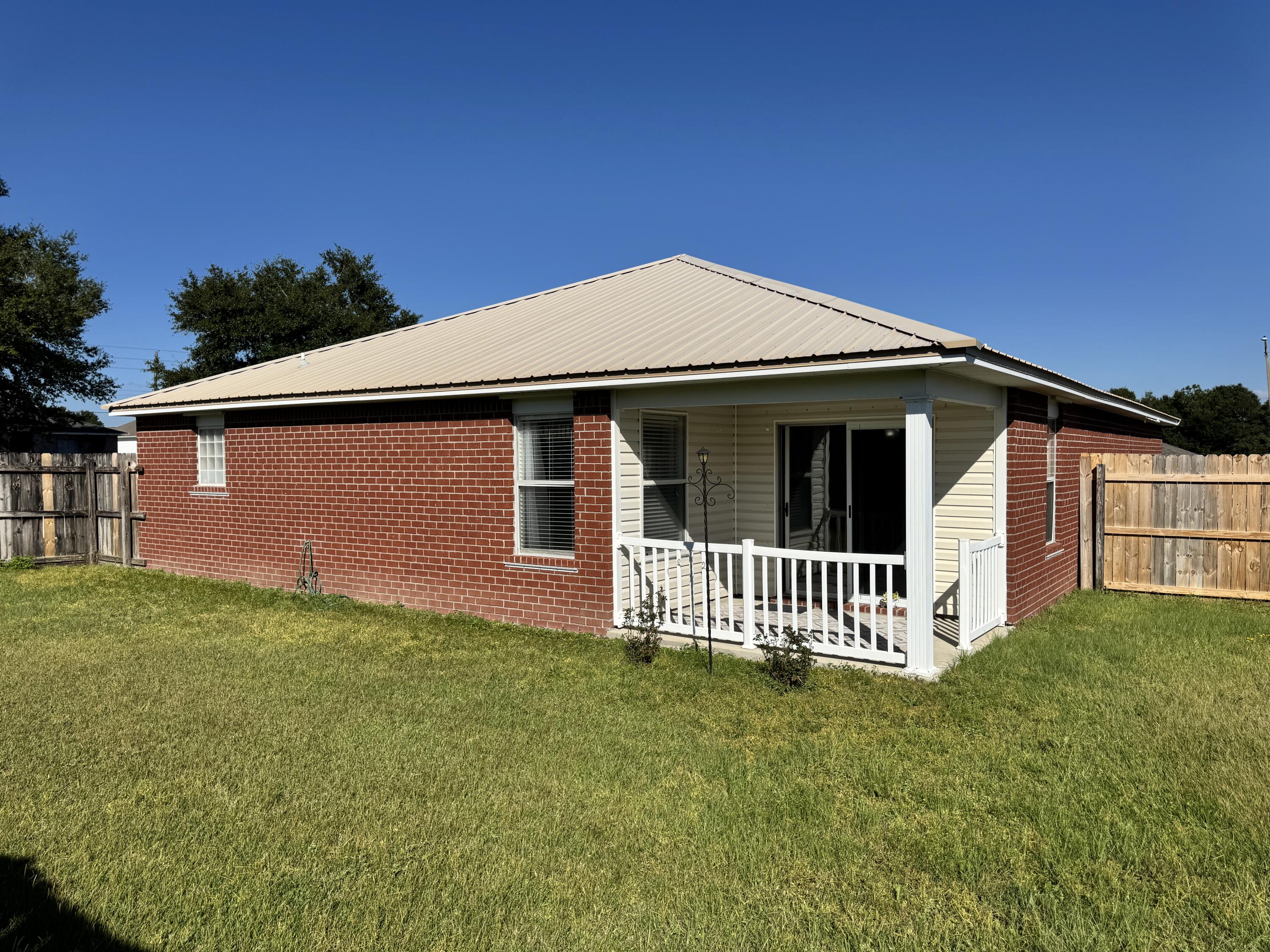 296 Limestone Circle Crestview, FL 32539 - Photo 4 of 29 Covered Back Porch