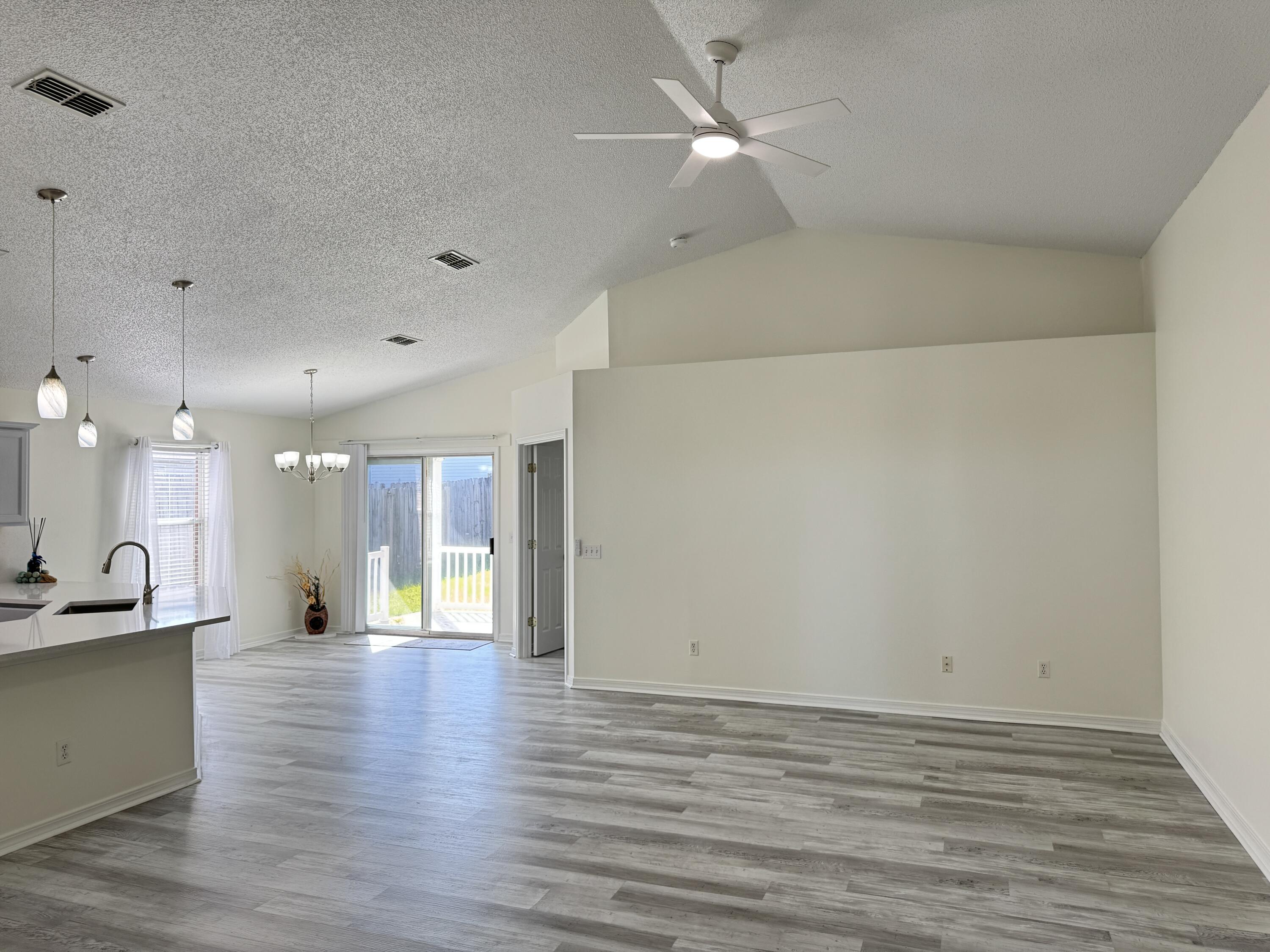 296 Limestone Circle Crestview, FL 32539 - Photo 5 of 29 Open Living/Kitchen/Dining Area