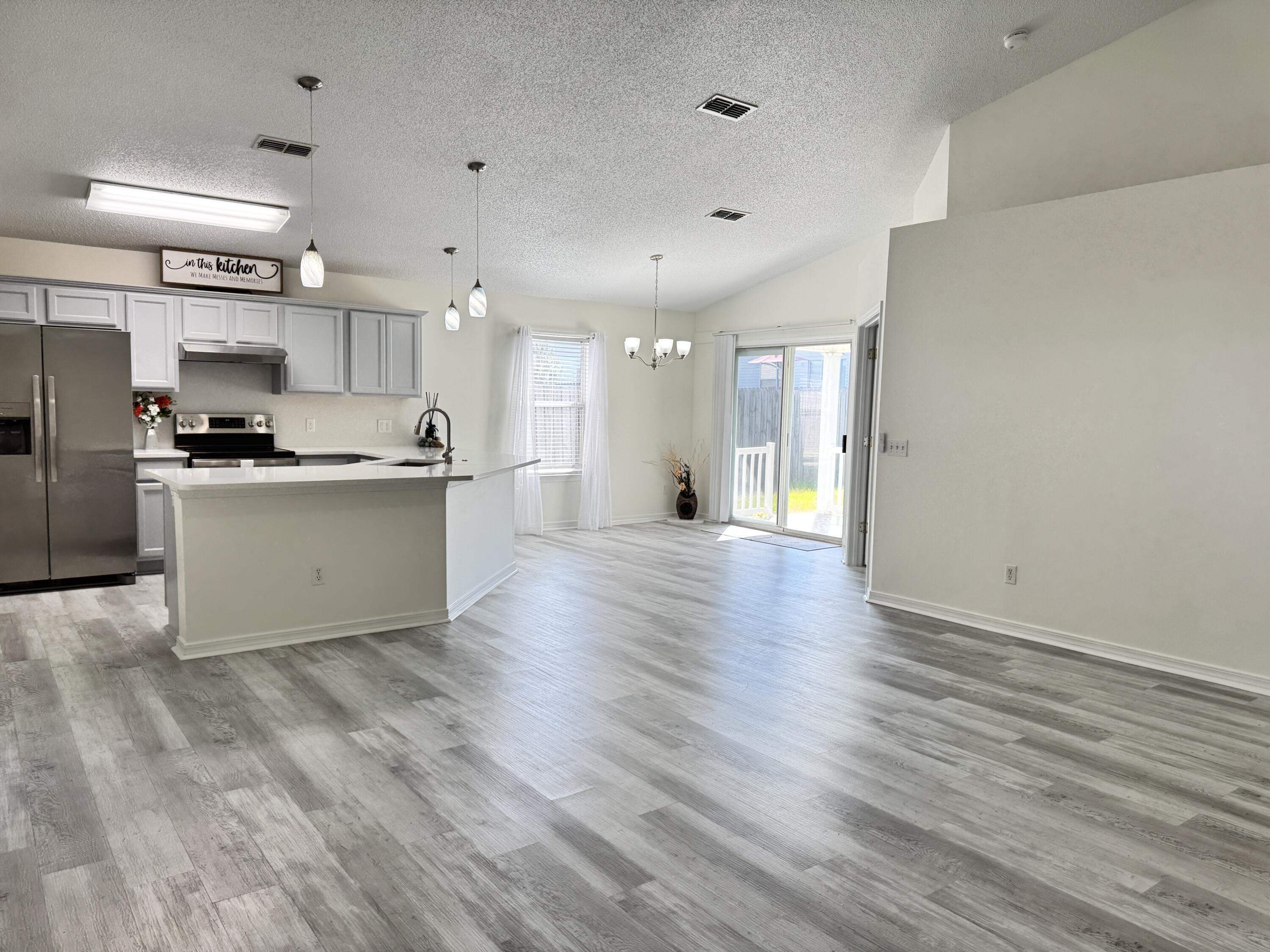 296 Limestone Circle Crestview, FL 32539 - Photo 6 of 29 Open Living/Kitchen/Dining Area