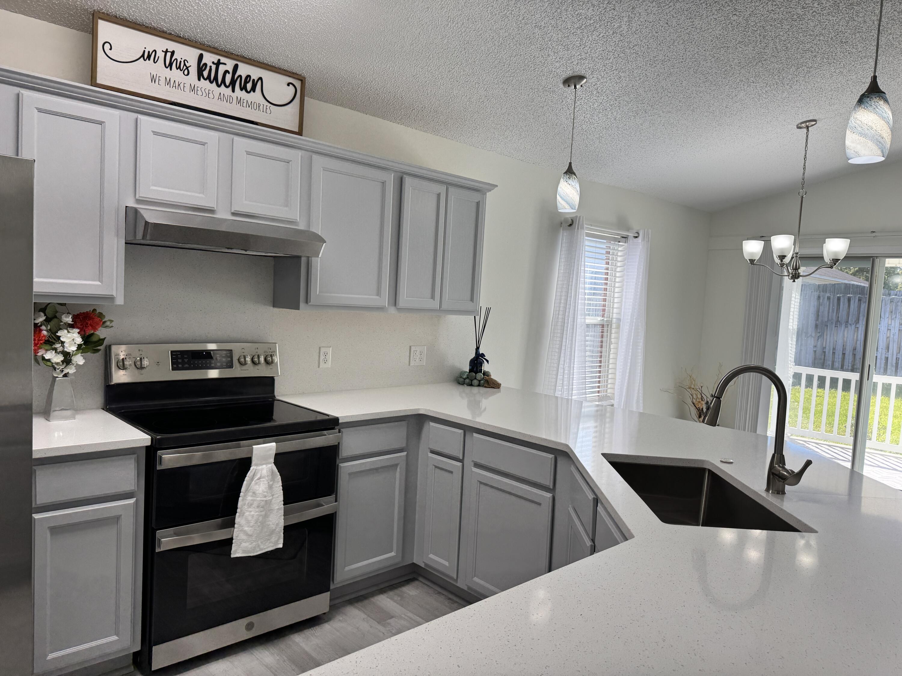 296 Limestone Circle Crestview, FL 32539 - Photo 8 of 29 Open Living/Kitchen/Dining Area