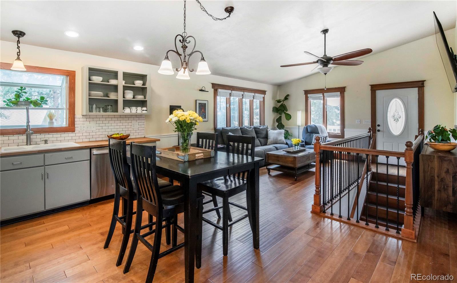 4805 Blue Spruce Road Evergreen, CO 80439 - Photo 10 of 43 a view of a dining room with furniture window and wooden floor