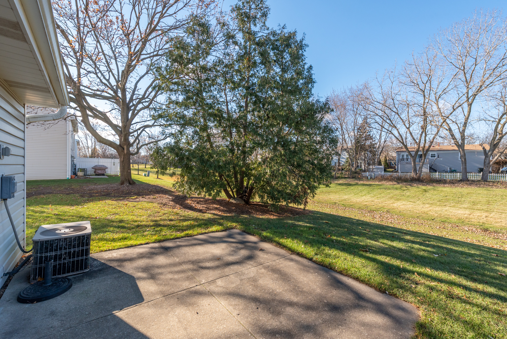 354 Rodenburg Road Roselle, IL 60172 - Photo 22 of 26 a view of a swimming pool with a lounge chair