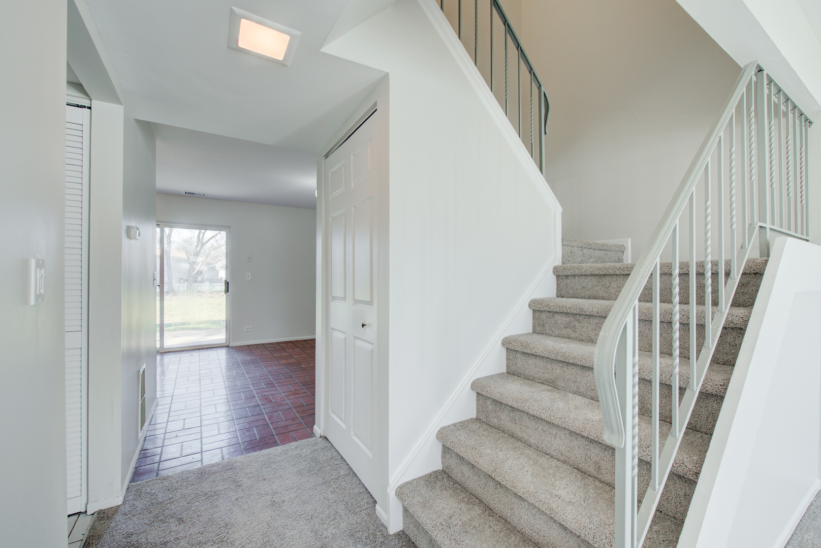354 Rodenburg Road Roselle, IL 60172 - Photo 7 of 26 a view of entryway with wooden floor