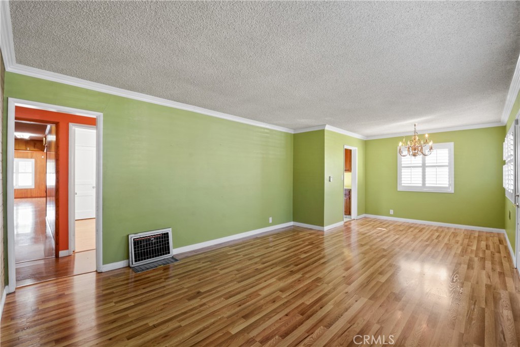 2202 West 153rd Street Compton, CA 90220 - Photo 8 of 36 LIVING ROOM LEADING TO DINING AREA
