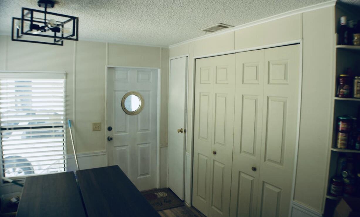 6554 Highway 441 Okeechobee, FL 34974 - Photo 15 of 22 a bathroom with a shower and a window