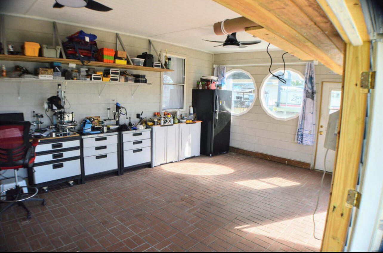 6554 Highway 441 Okeechobee, FL 34974 - Photo 17 of 22 a room with storage and utility