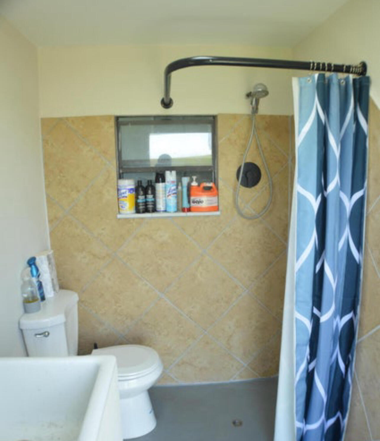 6554 Highway 441 Okeechobee, FL 34974 - Photo 20 of 22 a bathroom with a toilet and a shower