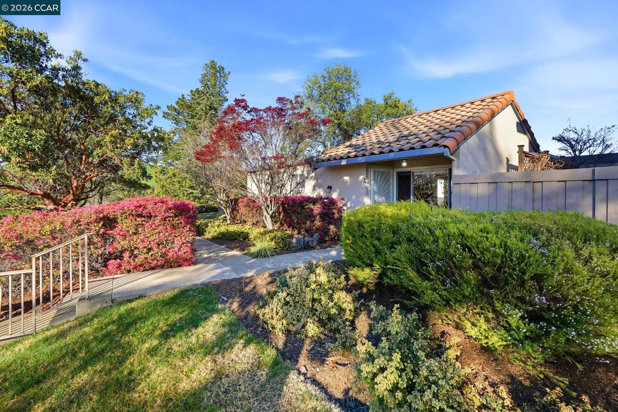 4 Mt Wilson Way Clayton, CA 94517 - Photo 1 of 1 a front view of a house with a yard
