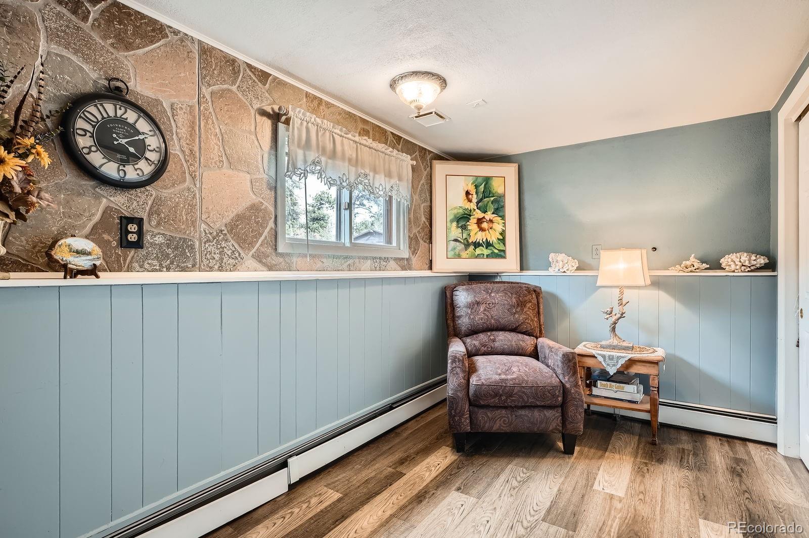 34886 Mohawk Trail Pine, CO 80470 - Photo 12 of 34 a living room with furniture and a window