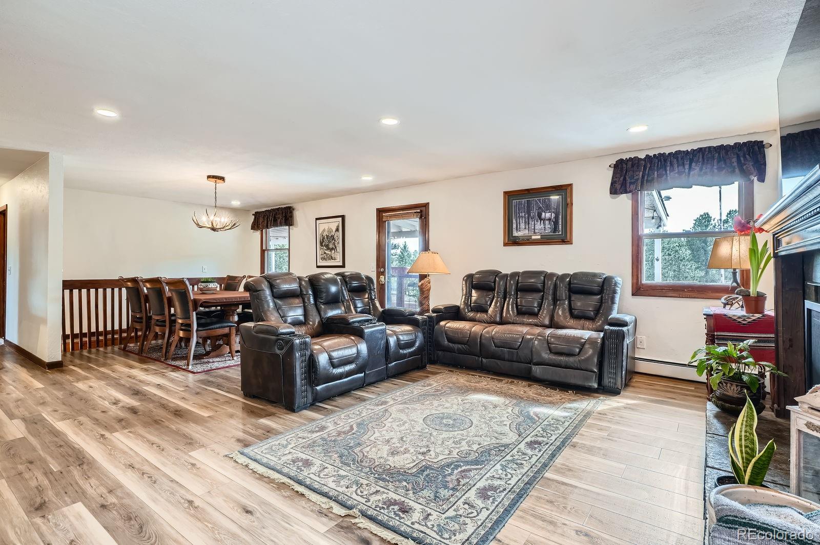 34886 Mohawk Trail Pine, CO 80470 - Photo 3 of 34 a living room with furniture kitchen view and a window