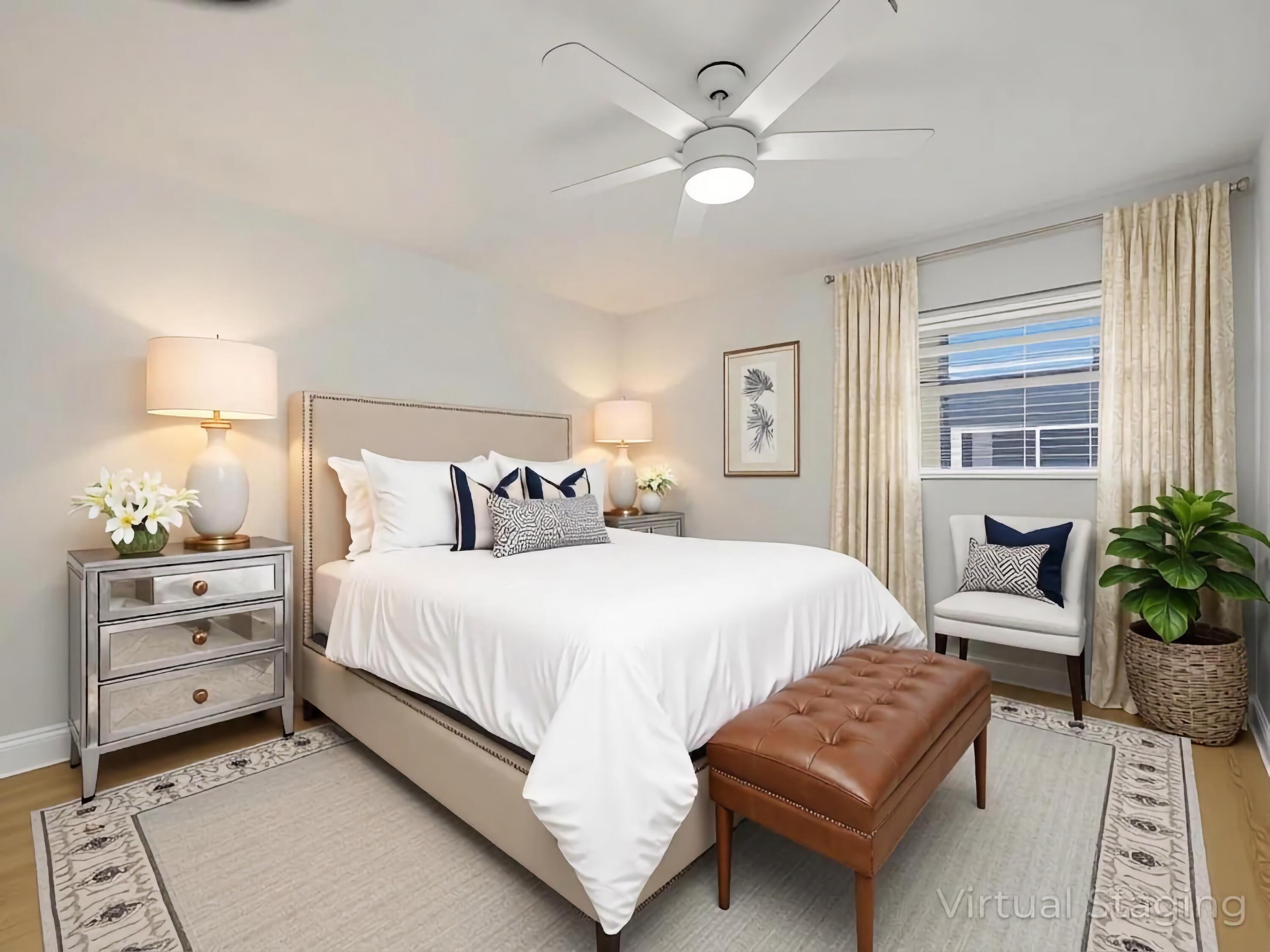 699 Flanders O Delray Beach, FL 33484 - Photo 15 of 39 a bedroom with a bed and window