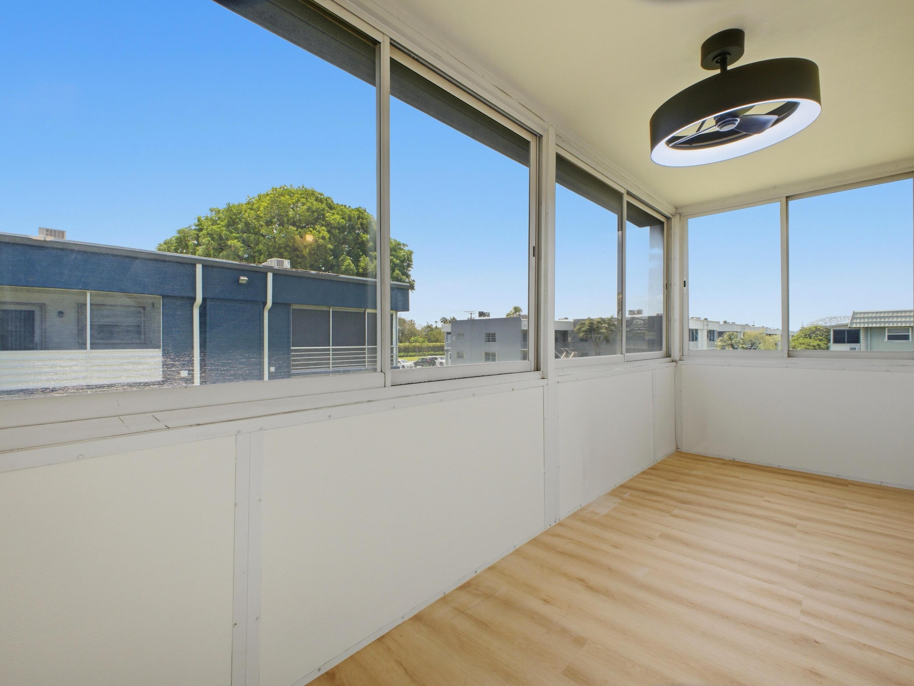 699 Flanders O Delray Beach, FL 33484 - Photo 26 of 39 Enclosed Balcony