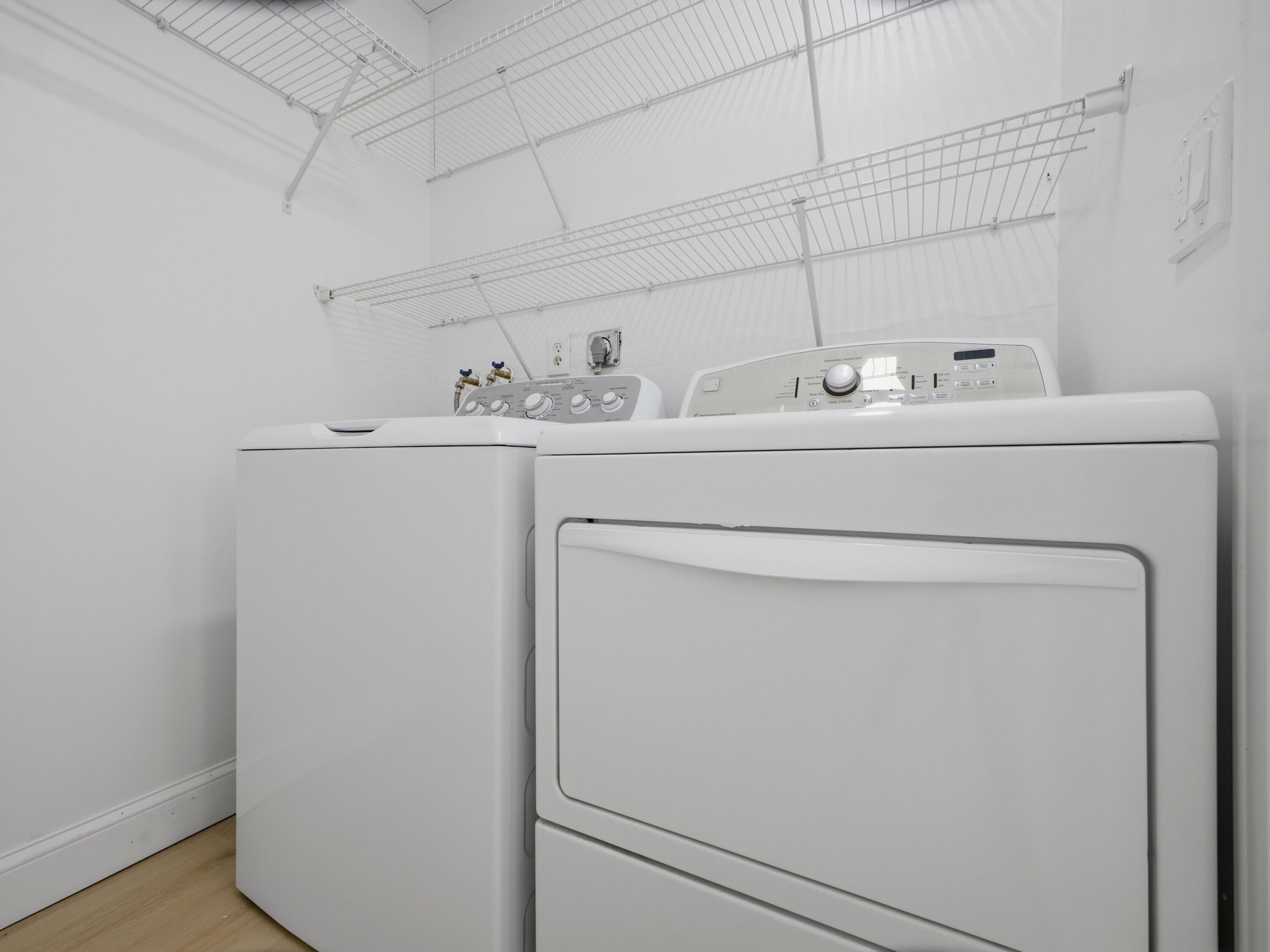 699 Flanders O Delray Beach, FL 33484 - Photo 27 of 39 a utility room with dryer and washer