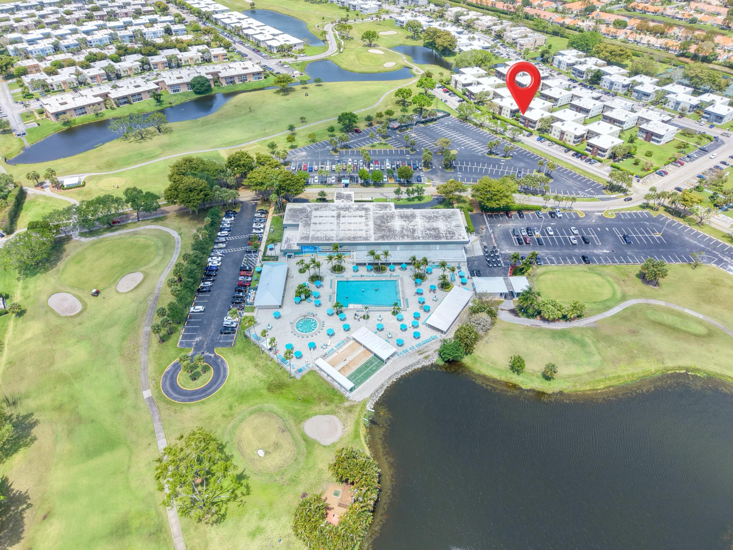 699 Flanders O Delray Beach, FL 33484 - Photo 34 of 39 a aerial view of a swimming pool and outdoor space