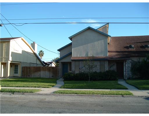 4746 Cedar Pass Drive, Unit A Corpus Christi, TX 78413 - Photo 1 of 1 a house that has a yard