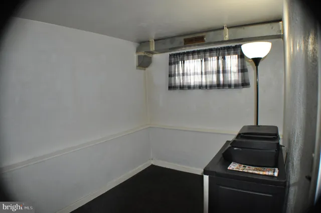 a kitchen with a refrigerator and stove