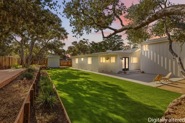 a view of a backyard with a garden